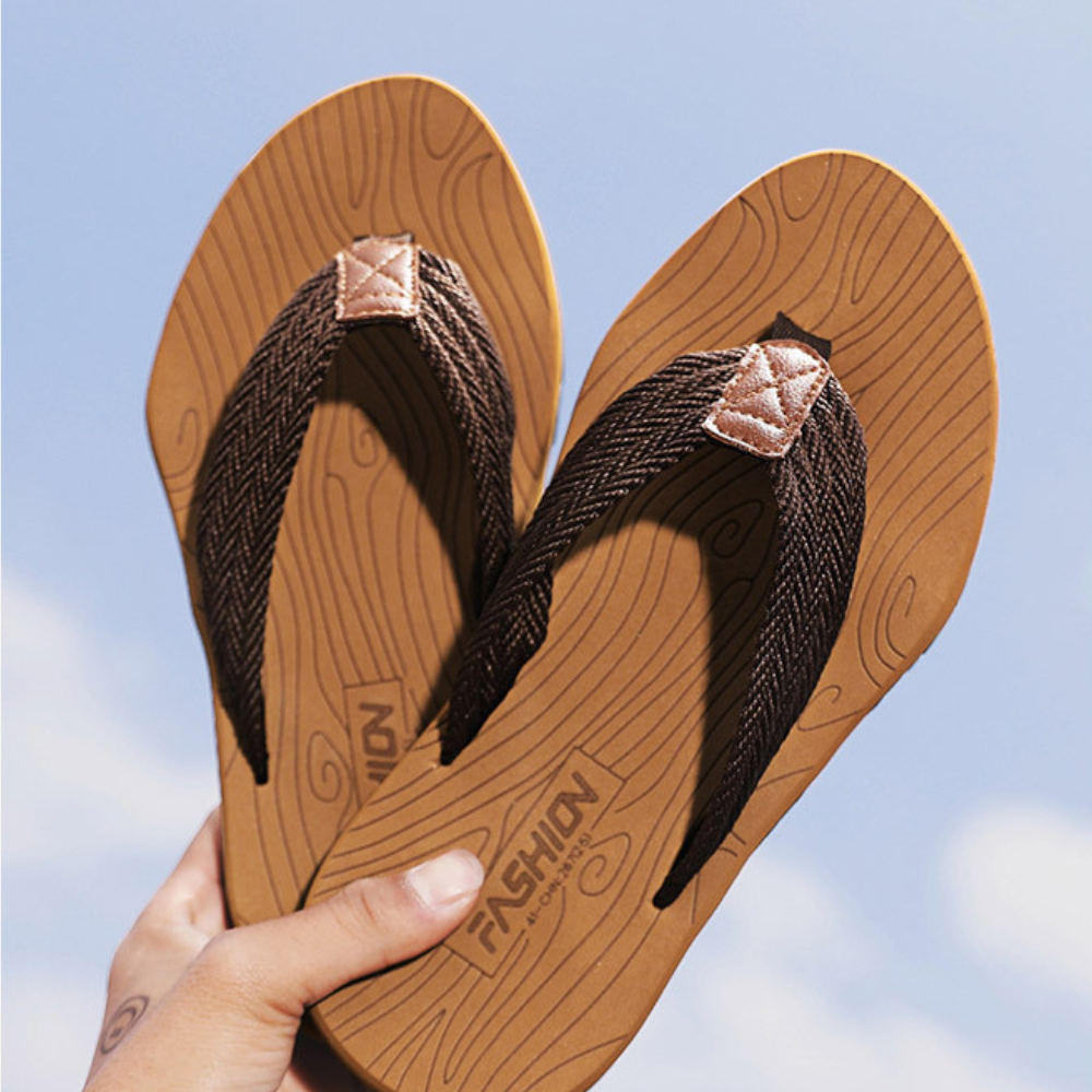 Padded strap orthopedic flip flops, ensuring comfort & arch support for all-day foot relief.