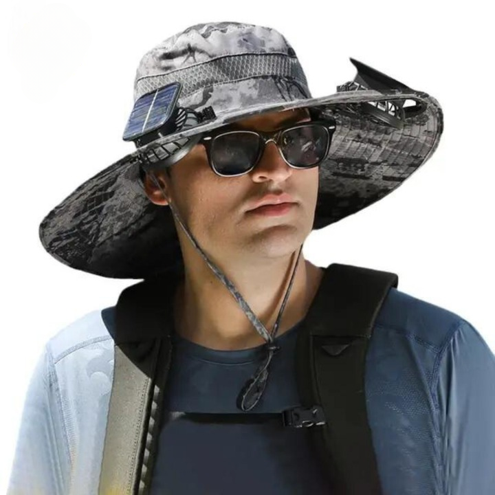 CoolBreeze unisex solar fan hat in a natural park setting, highlighting its outdoor use and function