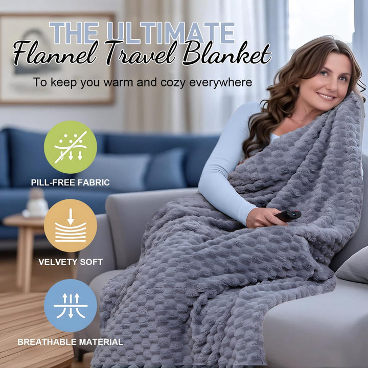 Traveler utilizing the packable blanket for warmth on an airplane, a true travel accessory