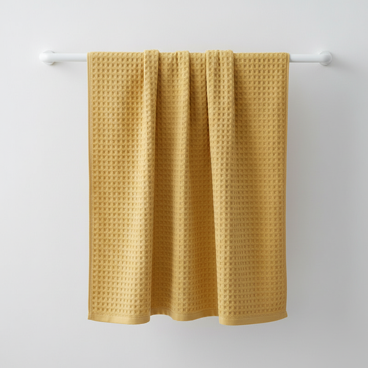 FreshWrap luxury Pima cotton towel in a spa setting, soft, antibacterial, and quick-drying bath linen