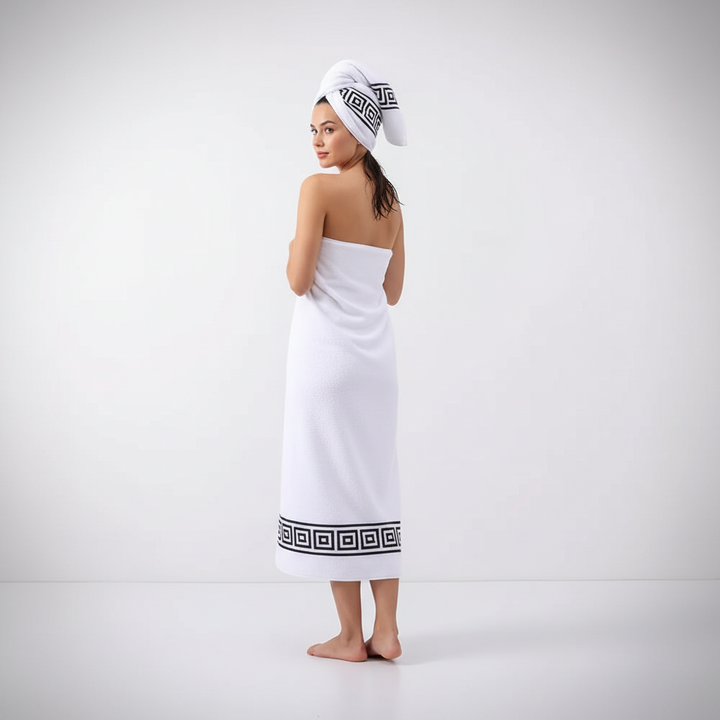 Close-up of fluffy white unisex bath towel set, two ComfortTowels, showcasing soft cotton texture.