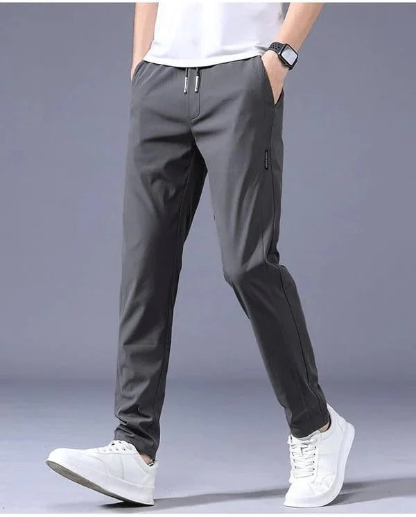 Breathable quick-dry stretch joggers, unisex for all-season outdoor activities.