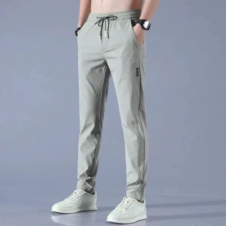 Quick-dry stretch joggers, unisex, providing freedom of movement and style.