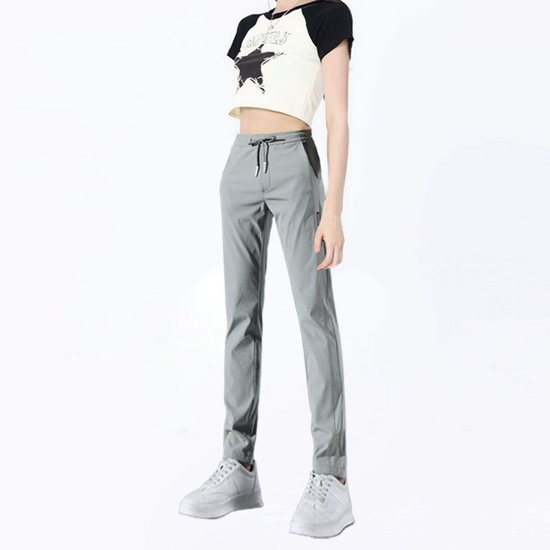 Unisex activewear pants, quick-drying & stretchable for outdoor activities and casual wear.