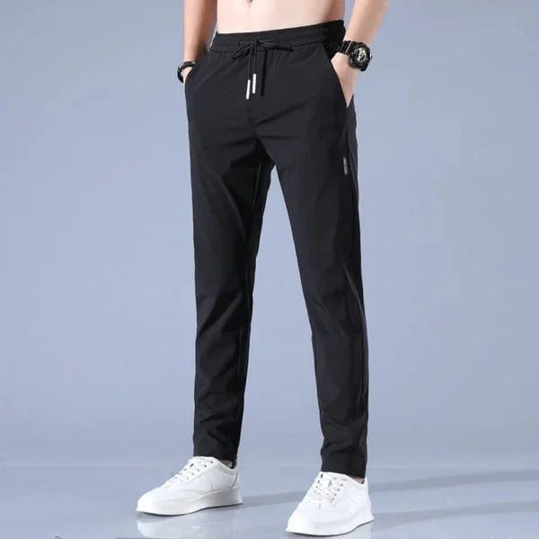 Unisex quick-dry joggers, comfortable activewear for running and leisure.