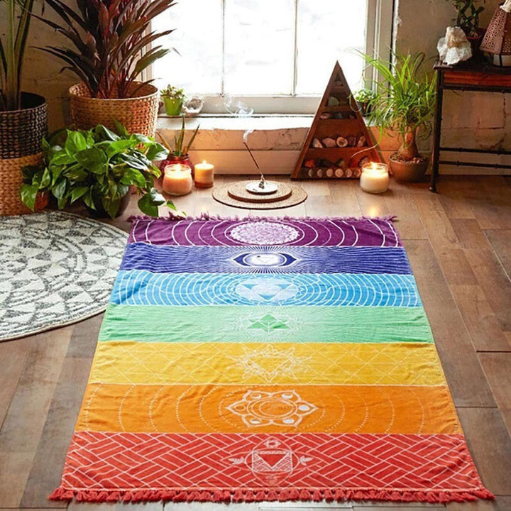 Meditator wrapped in ChakraBalance blanket, promoting wellness & energy. Perfect for spiritual relaxation.