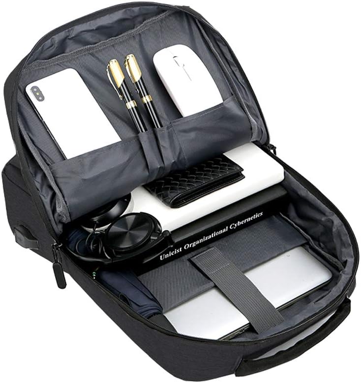 Close-up of the USB charging port on a black waterproof laptop backpack, highlighting convenience for travelers