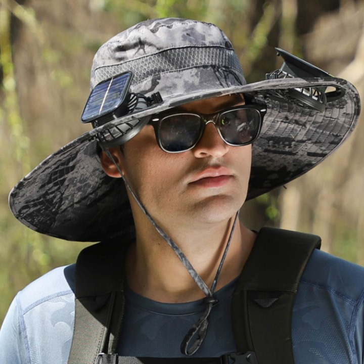 Unisex summer accessory: SolarCool VentiHut, a black cooling hat with UV protection and fan.