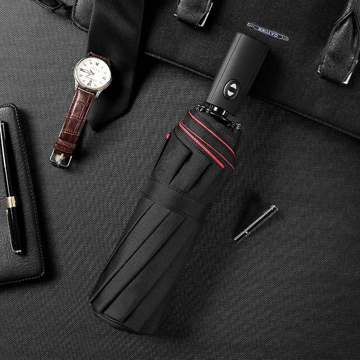 Open storm-proof folding umbrella, showing sturdy frame, offering reliable windproof rain protection