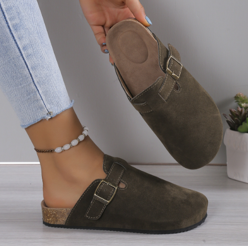 Easy wear unisex slip-on shoes in suede, featuring an adjustable buckle for everyday use.
