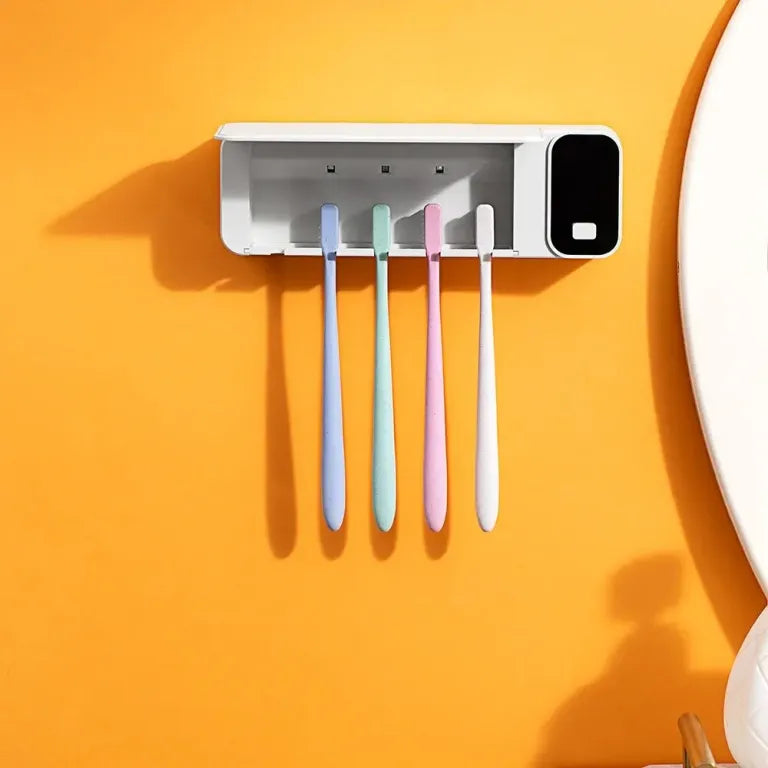 Modern wall-mounted UV toothbrush sterilizer and organizer, perfect for family bathroom care.