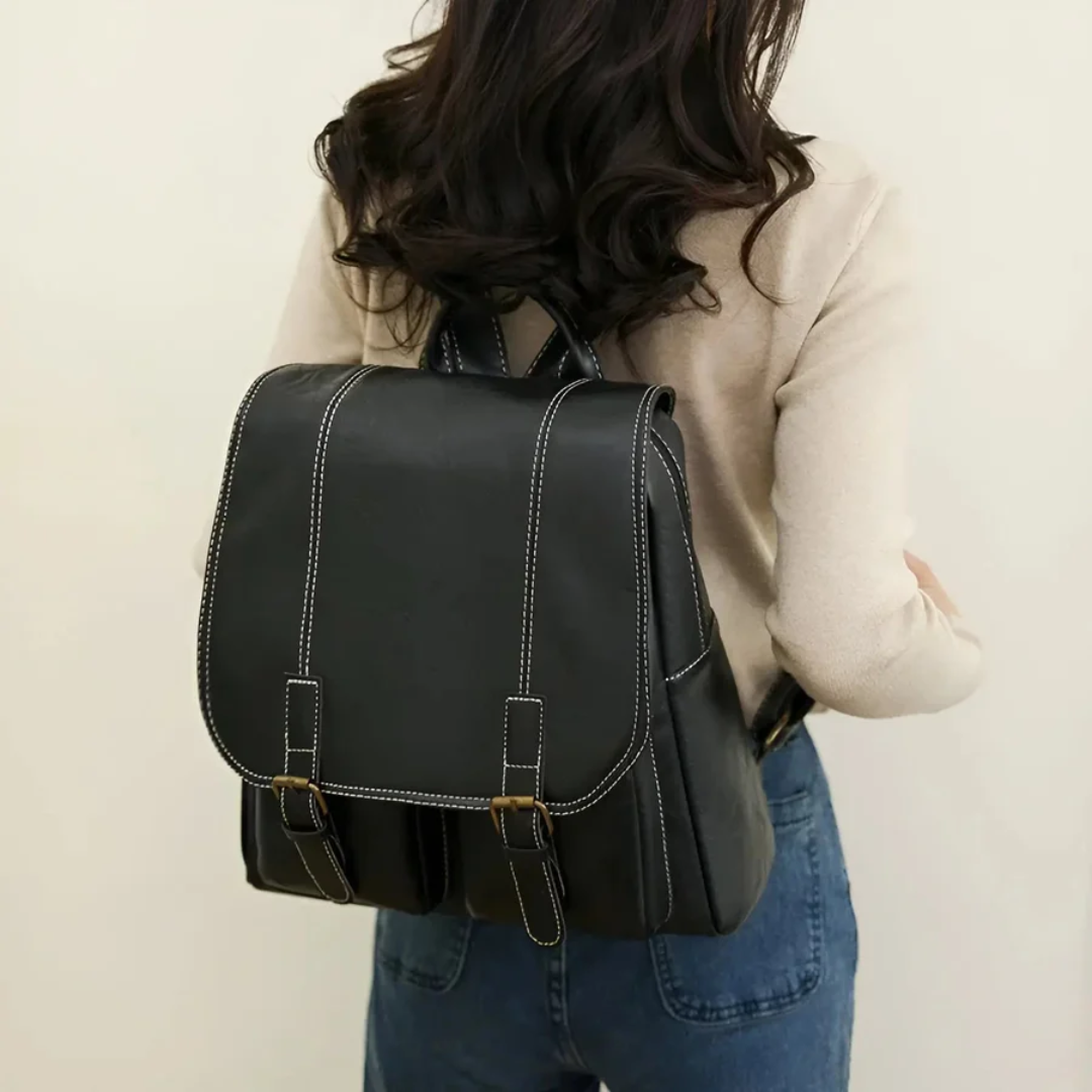 Classic black vintage backpack for school or work. Unisex retro style durable bag with laptop compartment.