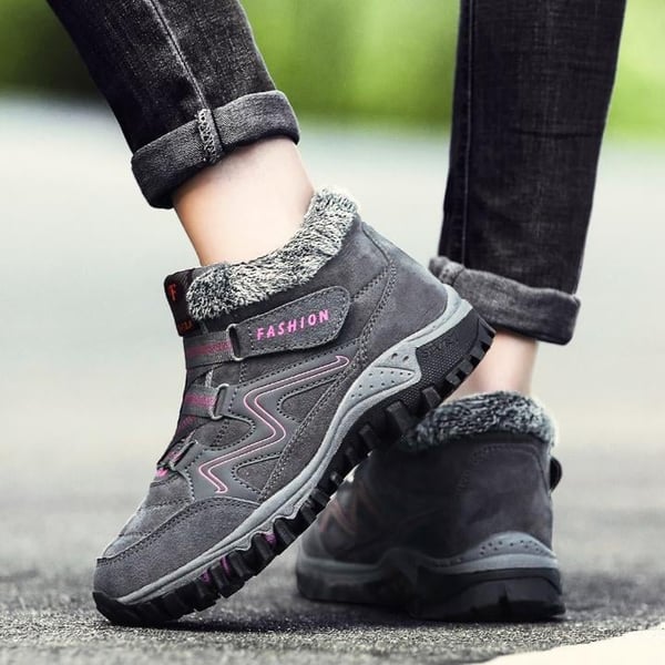 All-terrain unisex winter boots, waterproof, warm, non-slip, perfect for snowy environments.