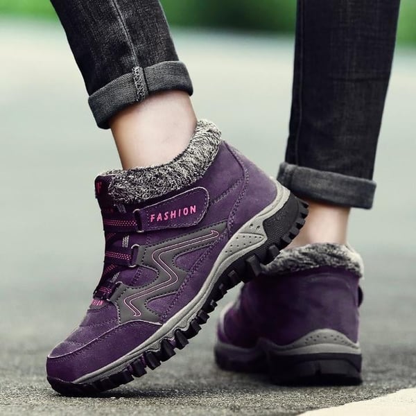 Cozy unisex snow boots, waterproof, warm, with non-slip grip for ultimate winter safety.