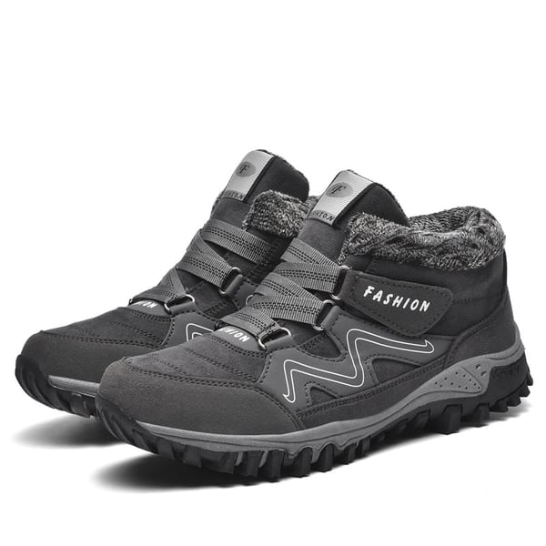 Cozy unisex winter boots, waterproof, providing warmth & non-slip grip in snow.