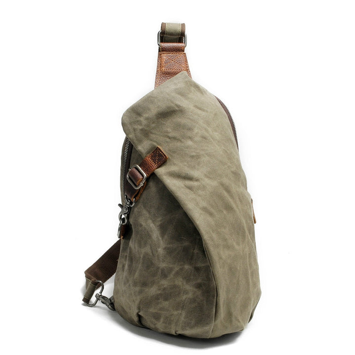 Stylish anti-theft crossbody bag for travel, water-resistant canvas, multiple pockets, side view