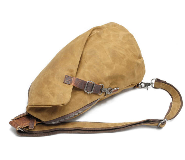 Unisex anti-theft crossbody bag, made from water-resistant canvas, showing interior organization
