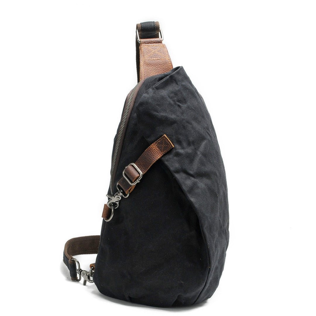 Modern unisex canvas sling bag in a neutral color, water-resistant with anti-theft security for urban explorers.