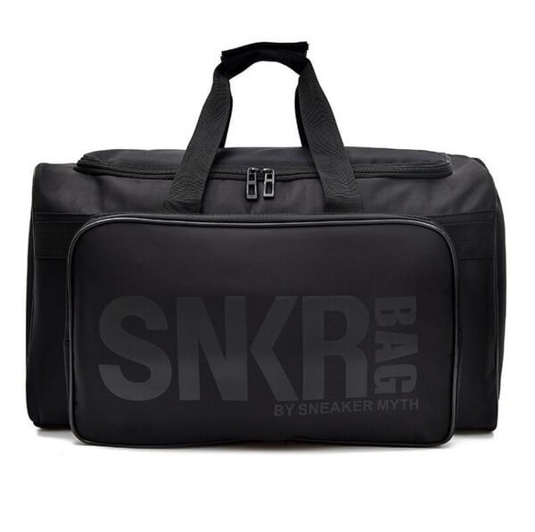 Top view of unisex water-resistant duffel bag with sneakers and gear organized inside