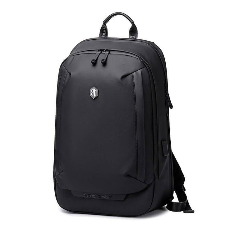 Durable water-resistant multi-compartment backpack for travel & hiking, featuring a sleek design & spacious interior.