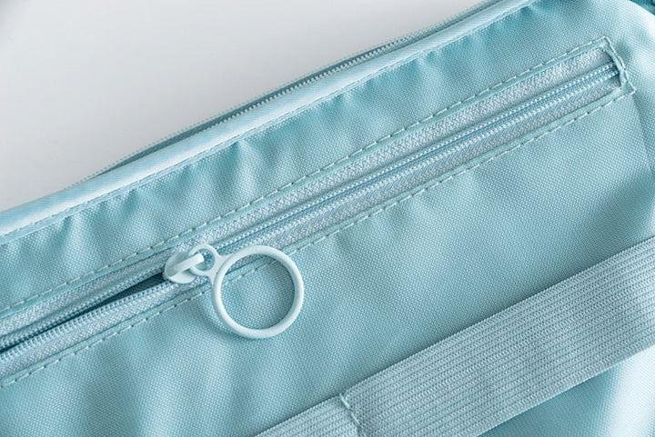 Compact electronics travel organizer, front view of the waterproof exterior
