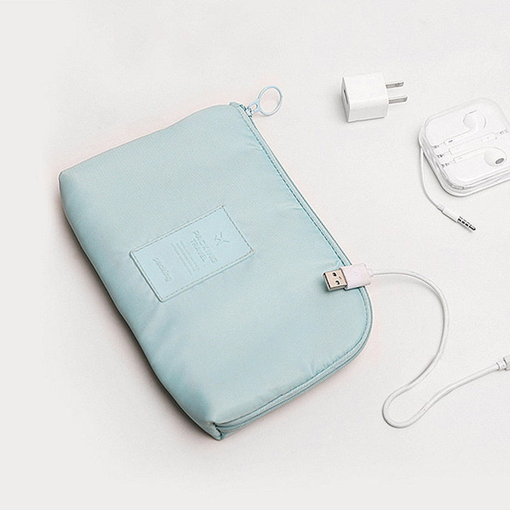 Black waterproof electronics organizer with an included mini storage case