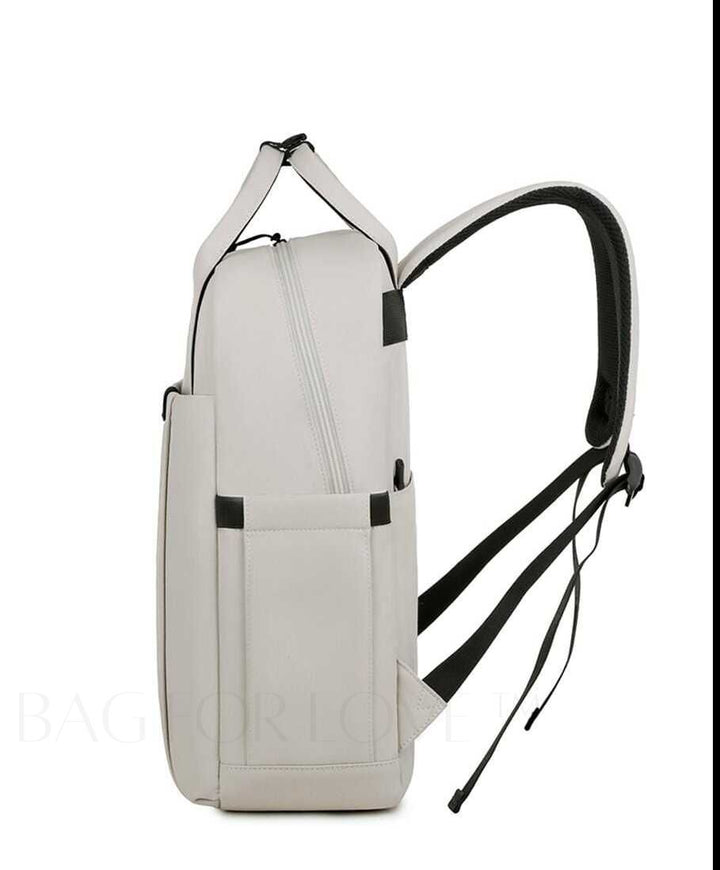 Stylish unisex waterproof commuter backpack, perfect for urban professionals & students.