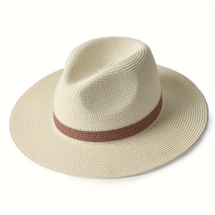 Stylish wide brim sun hat in a natural shade, breathable, delivering essential summer UV protection.