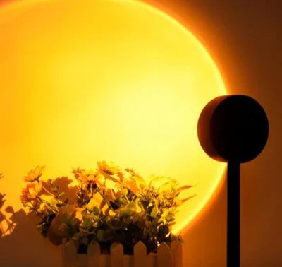 Home decor shot: USB LED sunset projector lamp illuminates a bedroom with a soft, ethereal golden light, night light