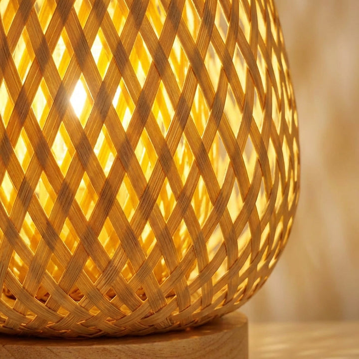 Solivue USB powered bamboo table lamp, showcasing natural wood texture and unique patterned light, a sustainable desk lamp.