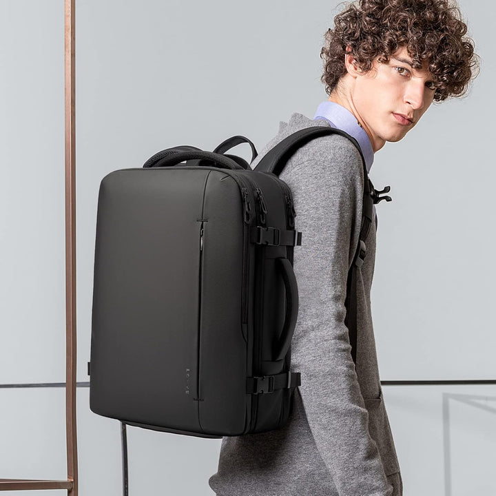 Expandable 45L waterproof travel bag, filled with travel essentials, ready for adventure.