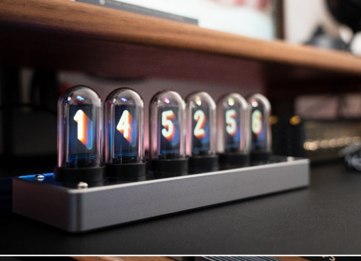 Industrial style metal vertical LED clock, Nixie tube aesthetic, ideal for desktop decor in a loft or modern home.