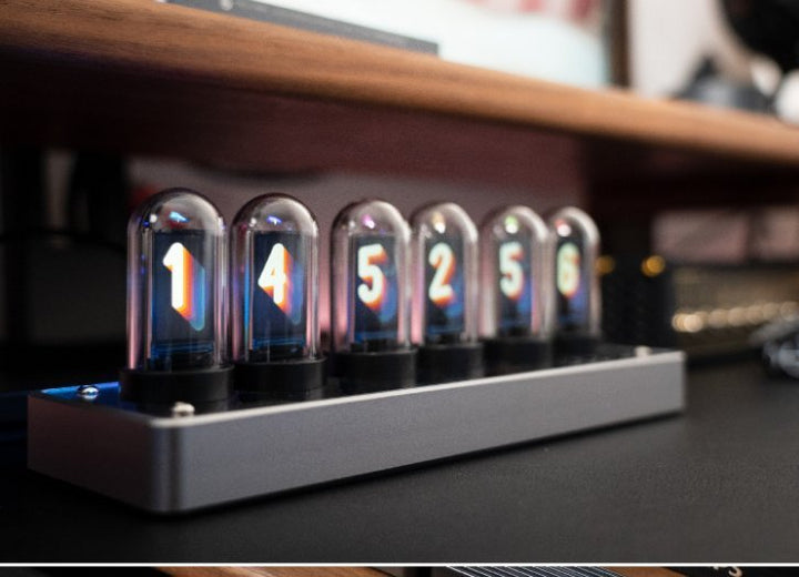 Industrial style metal vertical LED clock, Nixie tube aesthetic, ideal for desktop decor in a loft or modern home.