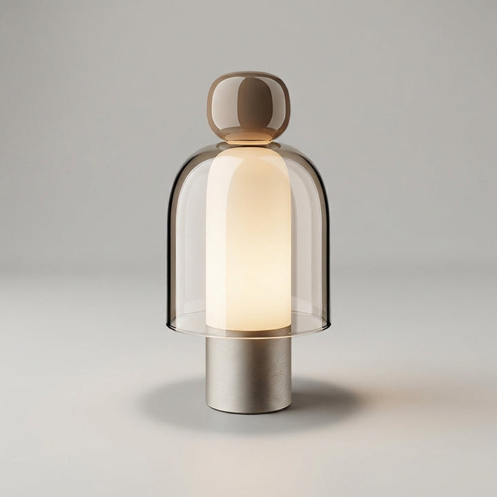 Two Vesanta rechargeable glass table lamps, cordless, providing soft dimmable light on a shelf