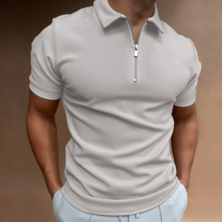 Detail of the breathable fabric texture on a VestoZip™ mens casual zip polo, quality material