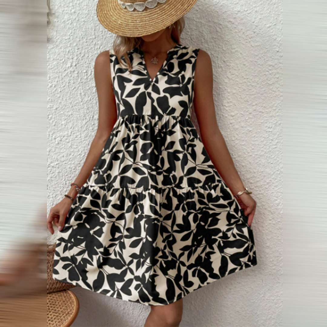 Vibrant boho summer midi dress for women, featuring a stylish print and flattering V-neck. Perfect for casual wear.