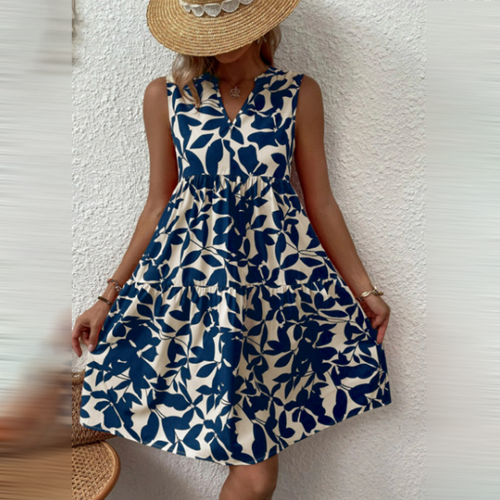 Stylish women's printed summer dress, midi length, with a V-neck and boho design. Great for casual & vacation outfits.