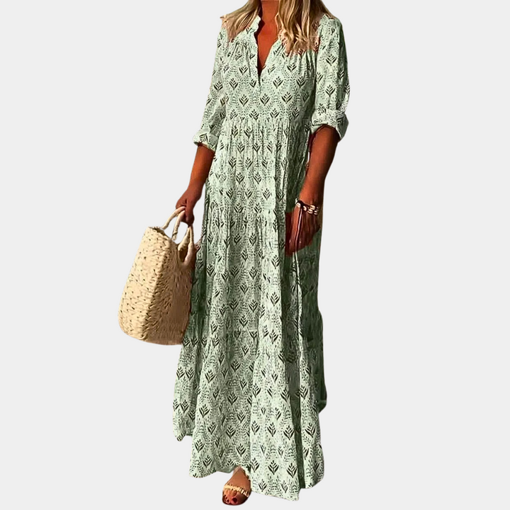 Comfortable women's Isla flowing maxi dress, a vibrant summer essential for beach, vacation, or casual wear.
