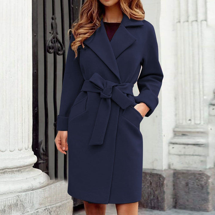 Long vibrant trench coat for women, a warm winter jacket with stylish button-front design.