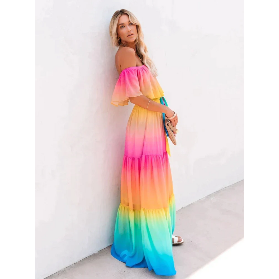 Vibrant multicolour sleeveless maxi dress for women, perfect for summer casual wear or vacation parties. Flattering fit.