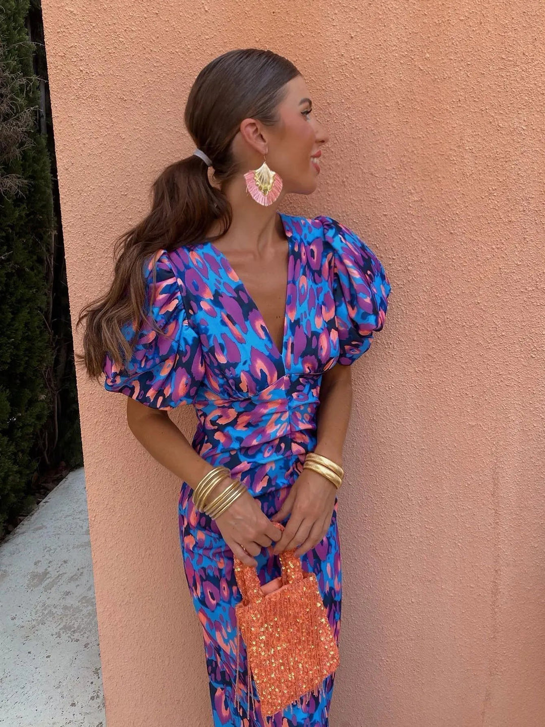 Vibrant women's midi dress with elegant pleated sleeves, perfect for comfortable and stylish summer wear.
