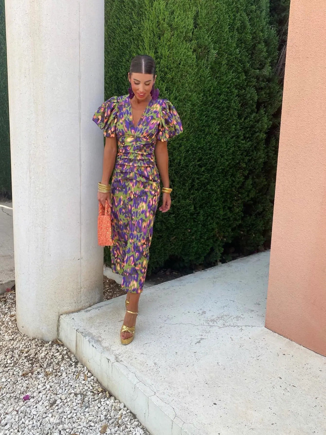 Stylish women's vibrant dress with pleated sleeves, designed for ultimate comfort and versatile summer fashion.