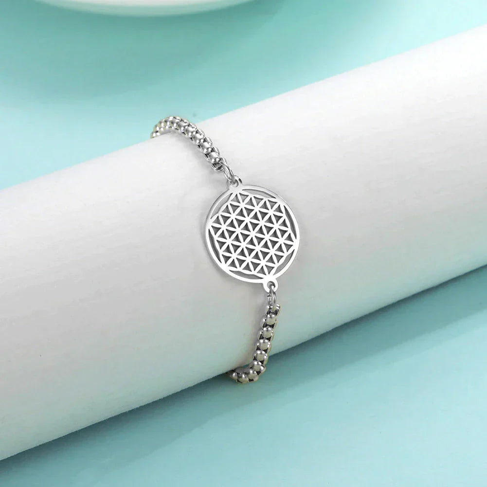Women's spiritual vintage Flower of Life balance bracelet with chakra stones, gold plated.