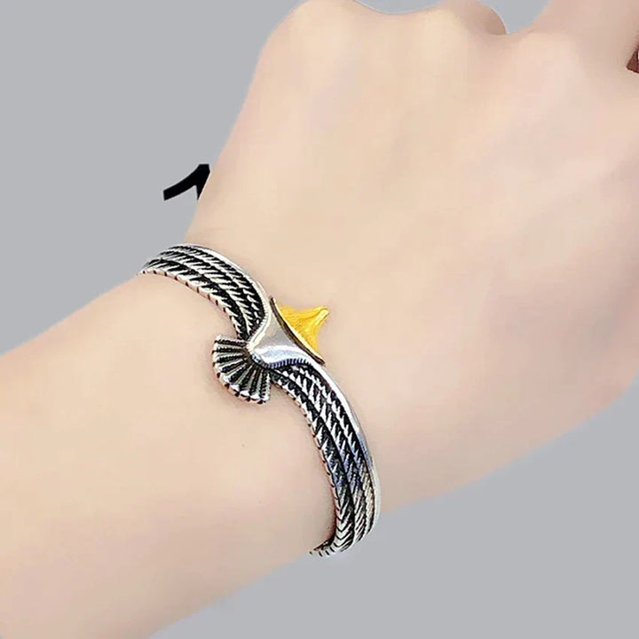 Creative boho eagle bracelet for women, a vintage stainless steel statement jewelry piece. Adjustable & unique.