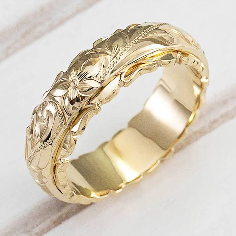 Vintage gold flower ring for women, an elegant floral jewelry piece, perfect gift.