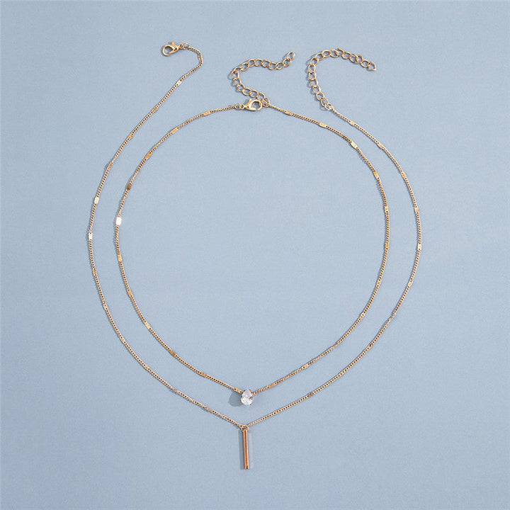 Sparkling gold & silver vintage pendant necklace set. Women's elegant jewelry accessory for any look.