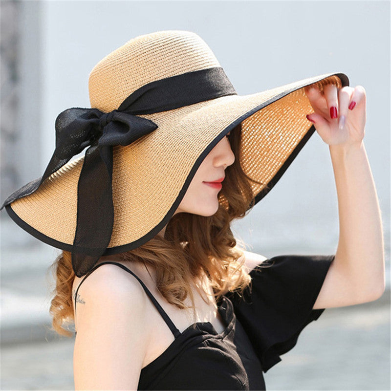 Vivian women's lightweight wide-brim summer sun hat in a vibrant color, offering stylish sun protection.