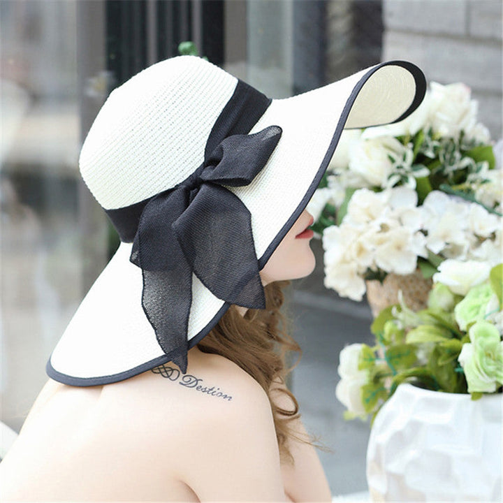 Fashionable Vivian lightweight summer hat for women, wide brim for ultimate sun coverage.