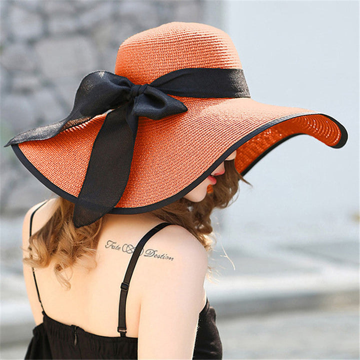 Vivian wide-brim beach hat for women, offering excellent UV protection and lightweight comfort.