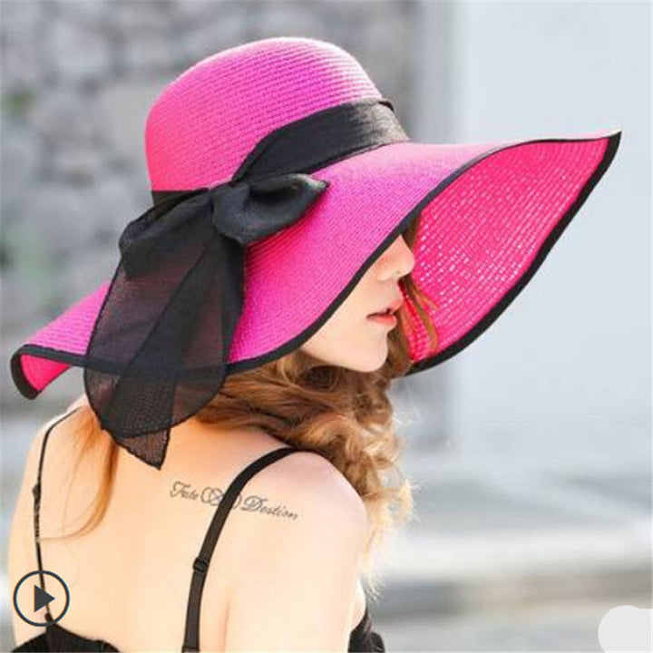 Women's Vivian wide-brim sun hat, a lightweight fashion accessory for beach and outdoor wear.